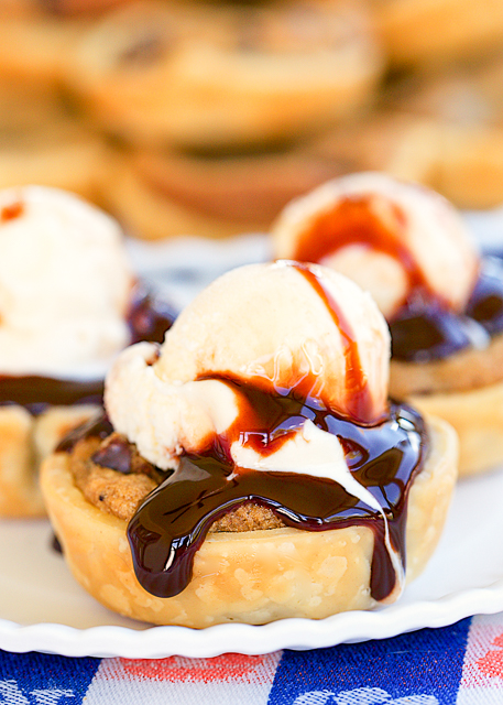 Deep Dish Chocolate Chip Cookie Pies - only 2 ingredients!! SO easy and SOOOO delicious! Top with ice cream and chocolate sauce to put these over the top. Great for parties and cookie swaps!