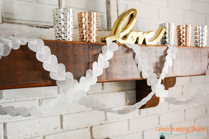DIY Wax Paper Valentine's Banner | This simple banner is translucent, shimmery, and a fun touch for Valentine's decor.