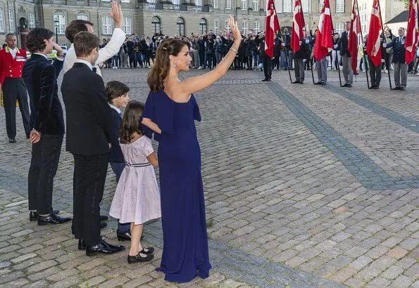 Crown Princess Mary wore a gown by Jesper Høvring. Princess Marie wore a gown by Rikke Gudnitz. Princess Isabella, Princess Alexandra