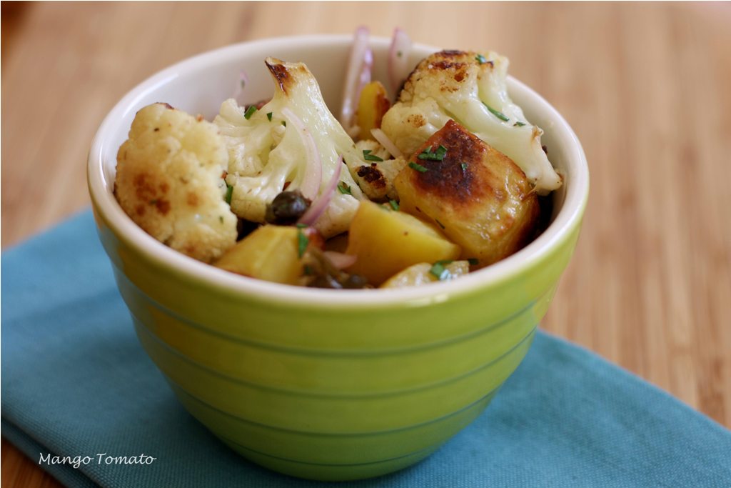 Mango & Tomato Roasted potatoes with cauliflower, capers & red onions