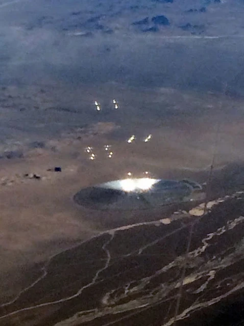 Original image of the Flying saucer seen near Area 51 photographed from a plane.