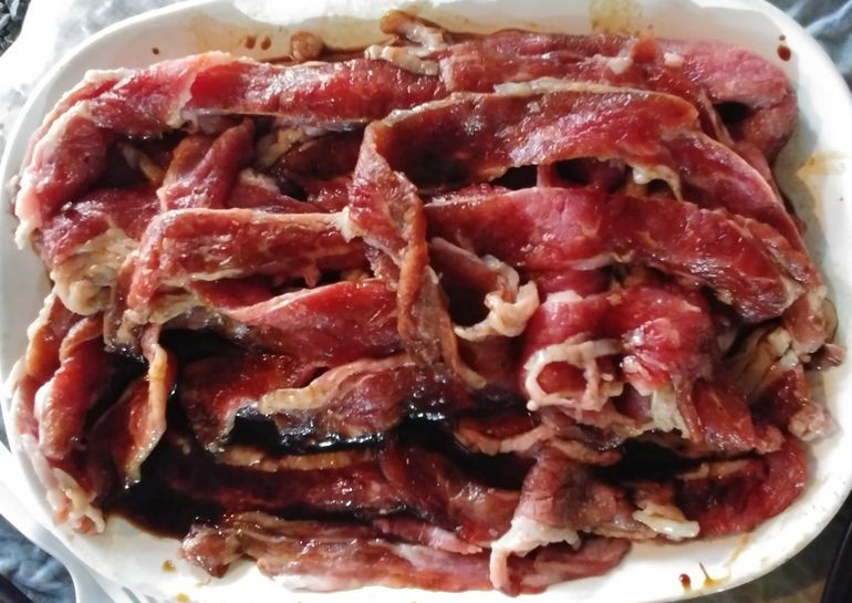 Strips of marinated beef at UKB 199 Unlimited Korean Barbecue Buffet