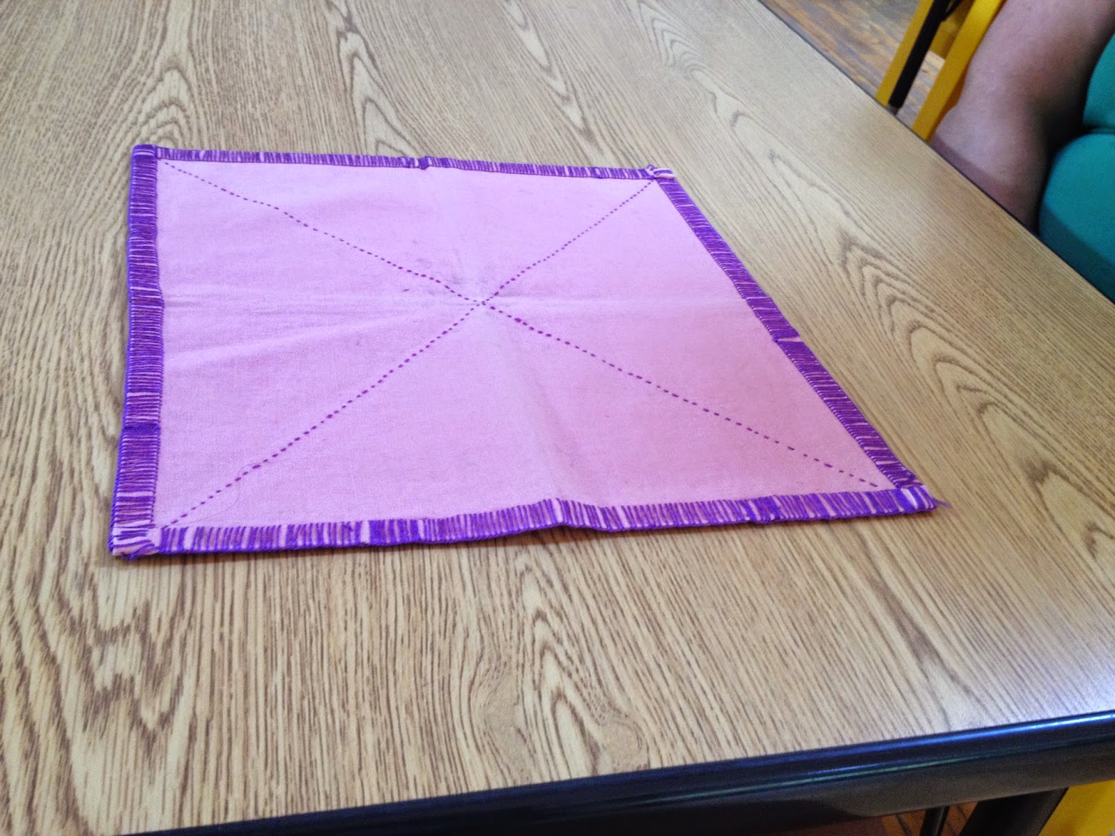 Evergreen Montessori House Everyday Montessori Folding a Napkin