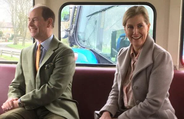 The Countess wore Suzannah Brodie wool long coat, Chloe peach blouse and lilac-coloured trousers, Hermes necklace