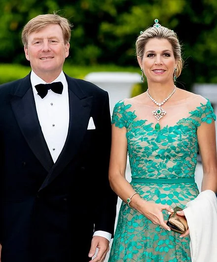 Queen Maxima wore a green lace gown by Jan Taminiau. Lace dress by Dutch designer Jan Taminiau. Green diamond earrings, tiara, necklace