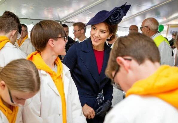 Crown Princess Mary officially opened Crown Princess Mary's Bridge in Roskilde.She is wearing blue coat and dolce Gabbana dress