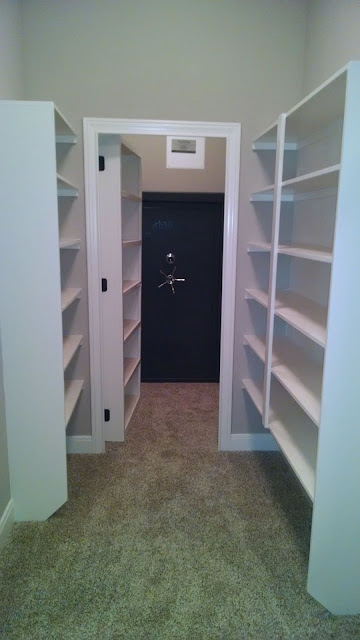 Built-In Shelving and Open Hidden Door
