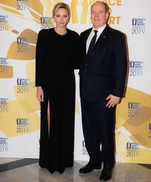 Princess Charlene wore Louis Vuitton long sleeve evening dress