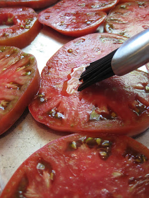 tomato slices on baking sheet