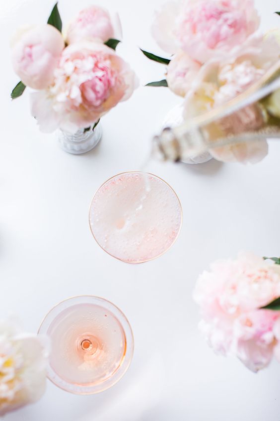 Pouring champagne over these Cotton Candy cocktails - Lauren Conrad