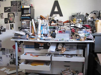 Work table of a miniature artist, in a complete mess.