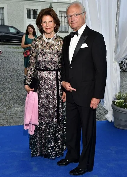 Prince Max of Bavaria, Duke Herzog in Bayern at Nymphenburg Palace. Queen Silvia wore Malane Birger, Valentino printed silk dress