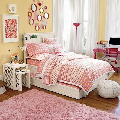 http://2.bp.blogspot.com/-9Ivu00FA8r0/Tzd-stl9Y0I/AAAAAAAAIM8/0jMWvb3AG3M/s400/teen-bedroom-girls-idea-space-saver-design-decor-yellow-orange-pink-clor-study-nook-trundle-bed-pouf-pretty-inspiration.jpg