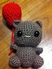http://www.ravelry.com/patterns/library/teddy-with-balloon