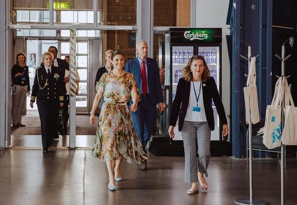 Crown Princess wore Frida dress by Swedish designer Jennifer Blom, and she wore By Malene Birger Pumps and carried Valentino shoulder bag