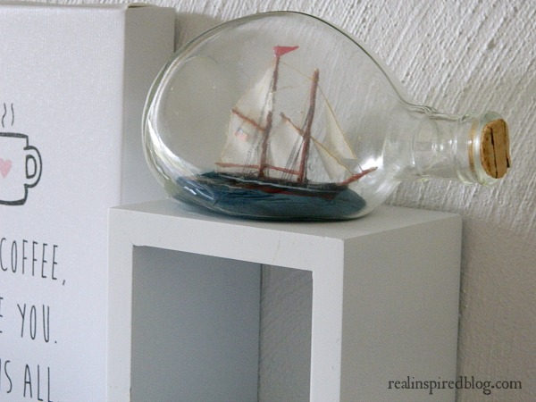 An Ocean Themed Office Gallery Wall-ship in a bottle