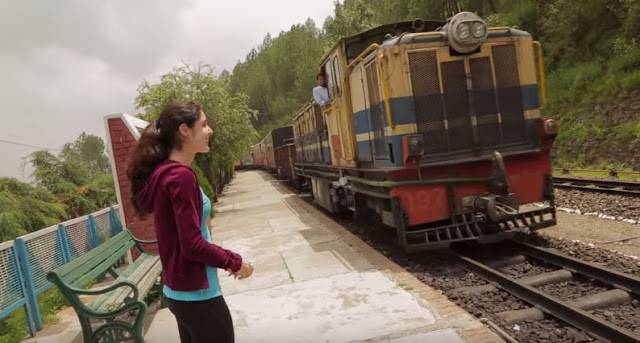 lady playful toy train