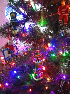 Robot and hockey player holiday tree ornaments