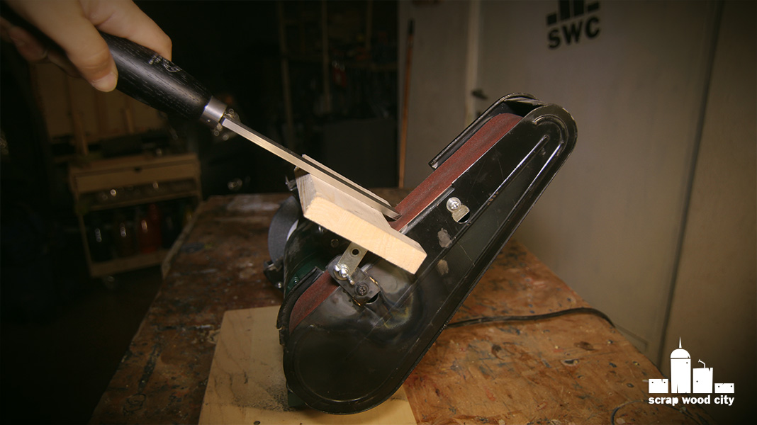 scrap wood city DIY tool rest for sharpening with the vertical belt sander