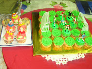 FOOTBALL AND CLOWN CUP CAKE