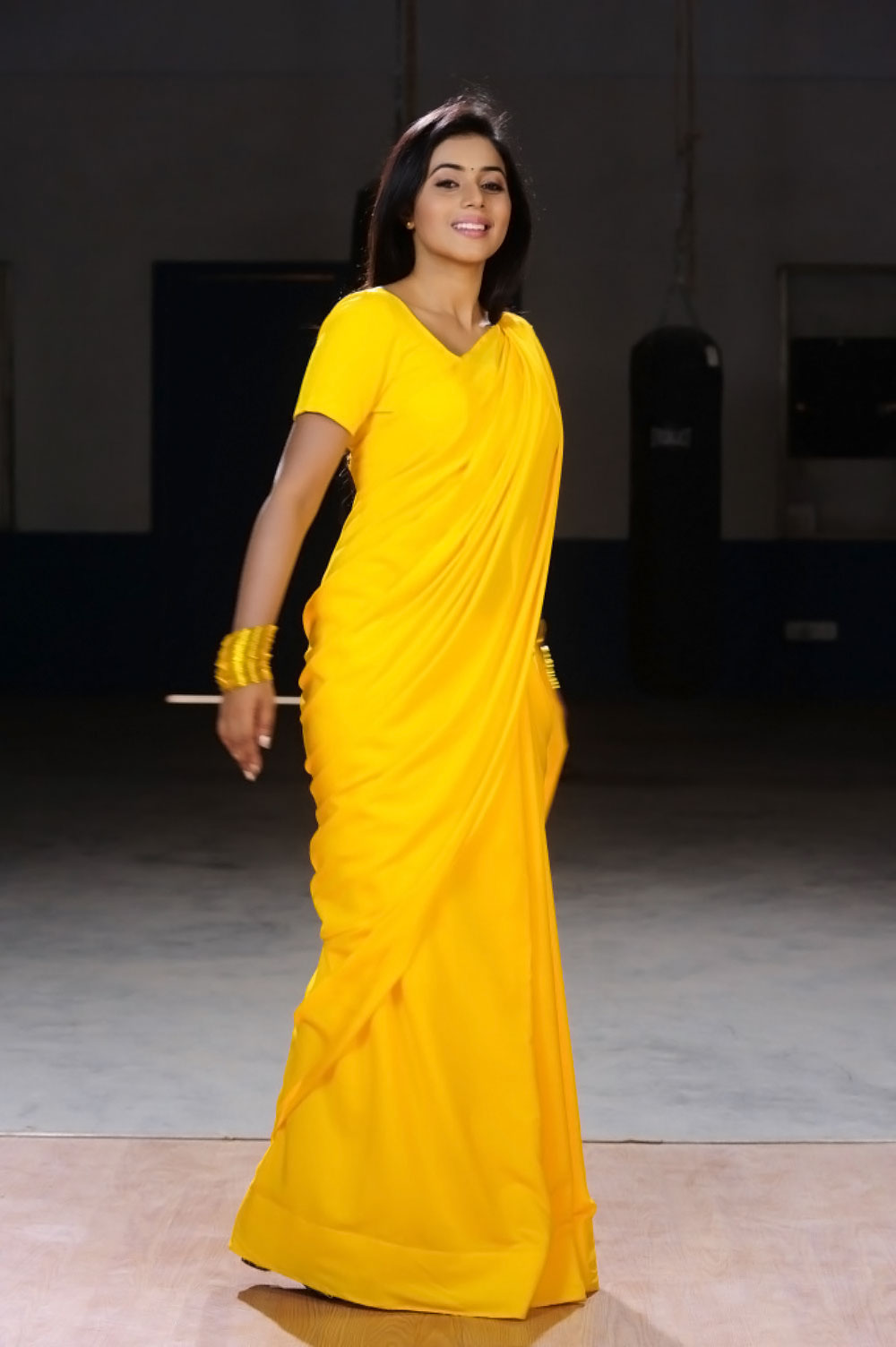Poorna Hot Looking Photos In Yellow Saree