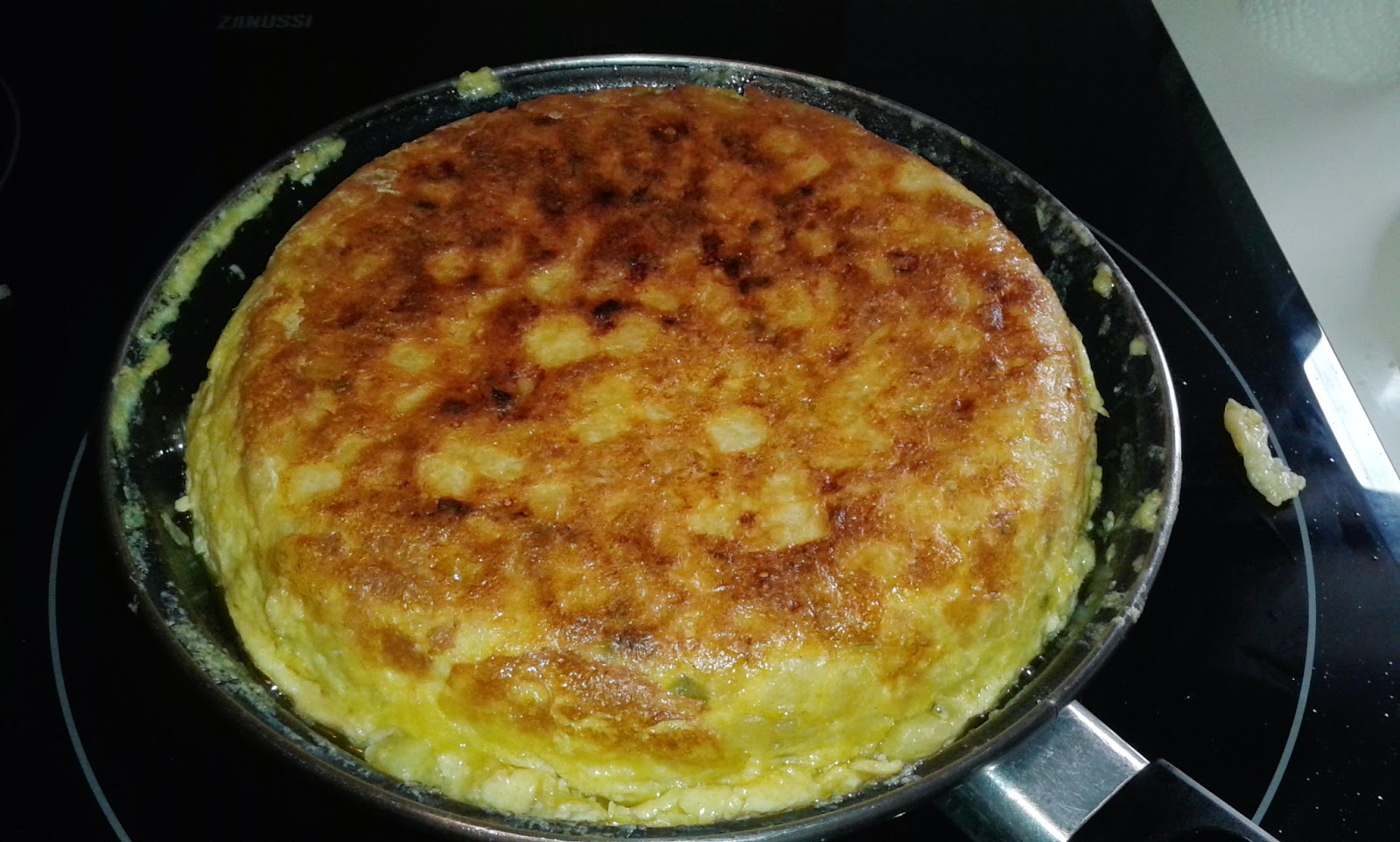 Recetas Cuatro fogones Tortilla de patatas con cebolla, pimiento y