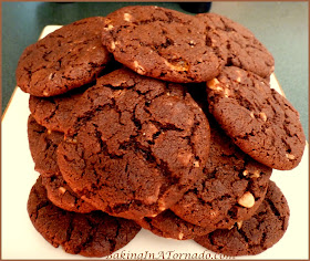 Toffee Butterfinger Crunch Cookies: A chocolate cookie with the crunch of toffee and butterfingers | Recipe developed by www.BakingInATornado.com | #recipe #cookies #chocolate