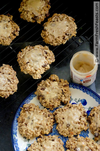 a plate of healthy breakfast cookies frosted with maple spread