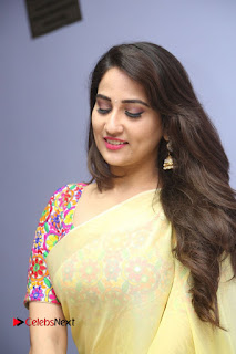 Telugu Actress Anchor Manjusha Stills in Yellow Saree at Janaki Ramudu Audio Launch  0017