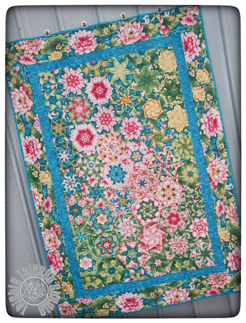 Dance of the Water Lilies Quilt by Thistle Thicket Studio. A One Block Wonder Quilt. www.thistlethicketstudio.com