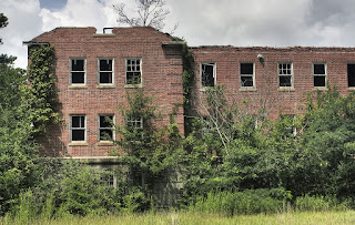 A latest image of Huge Red bricked Jemison Center or Old Bryce Hospital in Northport, AL