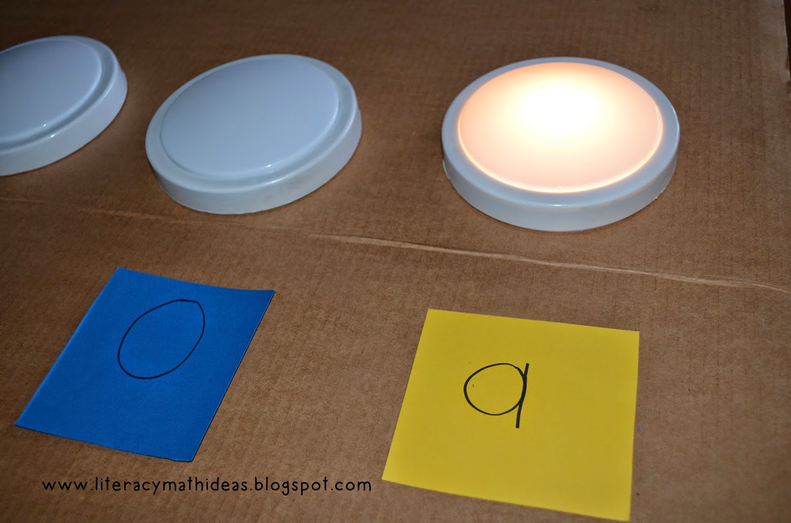 Literacy & Math Ideas Push Up Light Upper and Lower Case Letter
