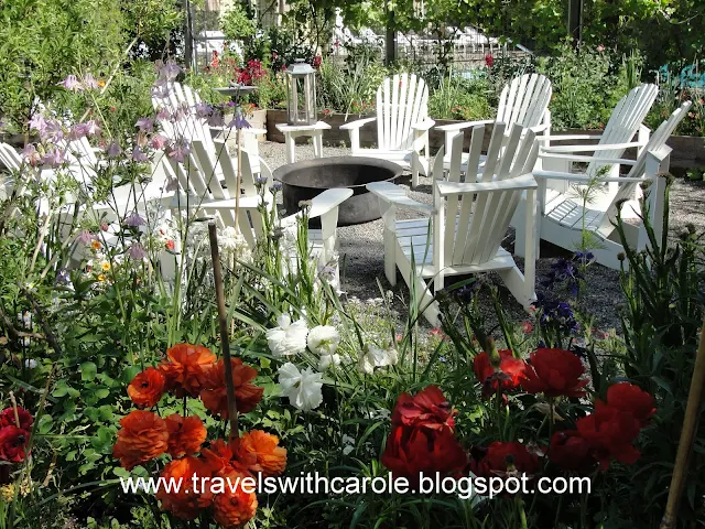 Adirondack chairs surround fire pit at The Farmhouse Inn in Forestville, California