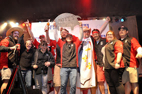 The Bacon Rouge team celebrates the Pork Butt victory at Hogs for the Cause 2015