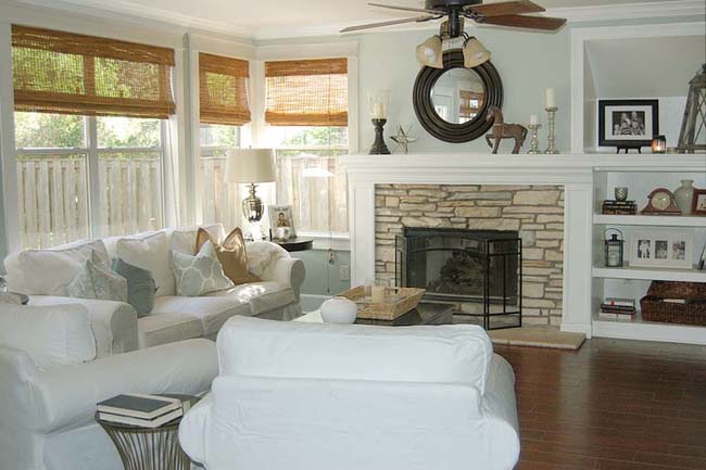 cottage style family room with white sofas