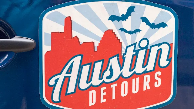 Austin Detours Tour Van Logo