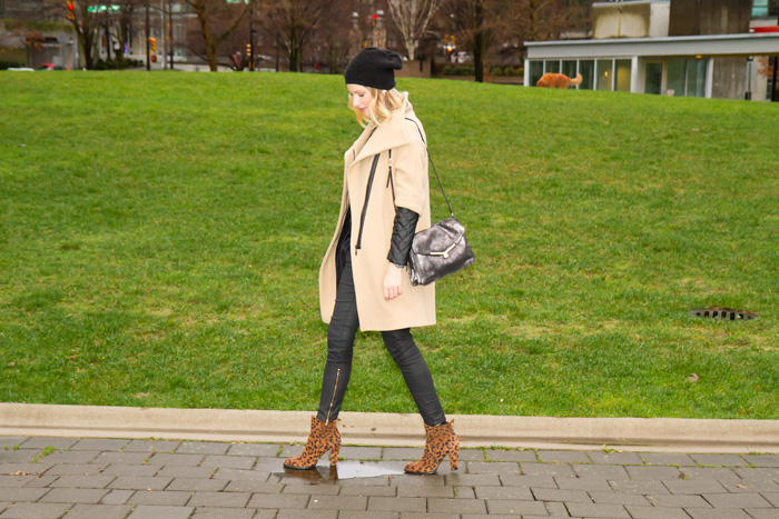 Vancouver Fashion Blogger, Alison Hutchinson, wearing Zara camel coat with leather sleeves, Zara black wax coated denim, Zara leopard print boots, Botkier silver treated leather bag, Stella and Dot renegade cluster bracelet, True Worth Design bronze bead bracelet, J Crew blue and gold bangle, Olivia Solie Jewelry triangle necklace