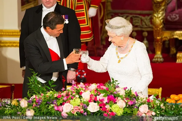 The Queen and the President of Mexico Enrique Pena Nieto toast during a state banquet at Buckingham Palace
