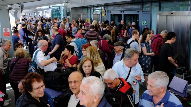 PHOTOS: Passengers stranded at airport terminals