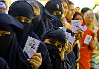 Indian Muslim Hindus standing together in line for voting in BMC eletcions in Ayodhya