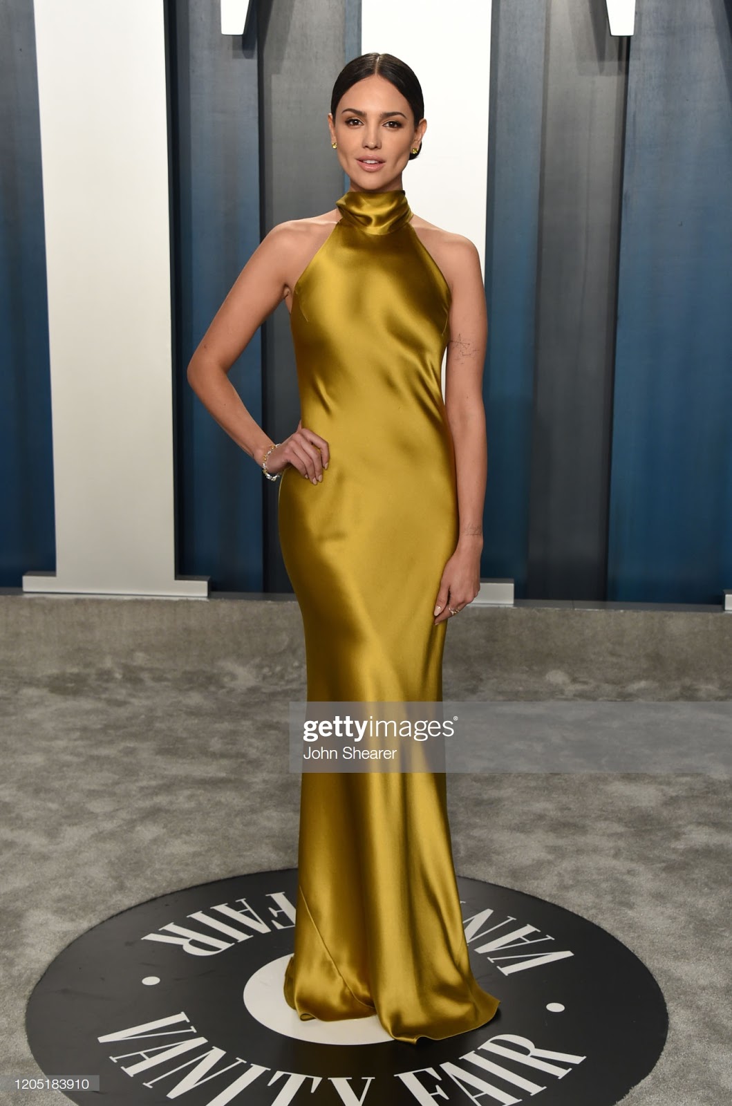 Ladies in Satin Blouses: Eiza Gonzales - gold satin dress