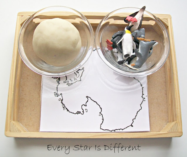 Montessori-inspired play dough and penguins Antarctica activity for kids.