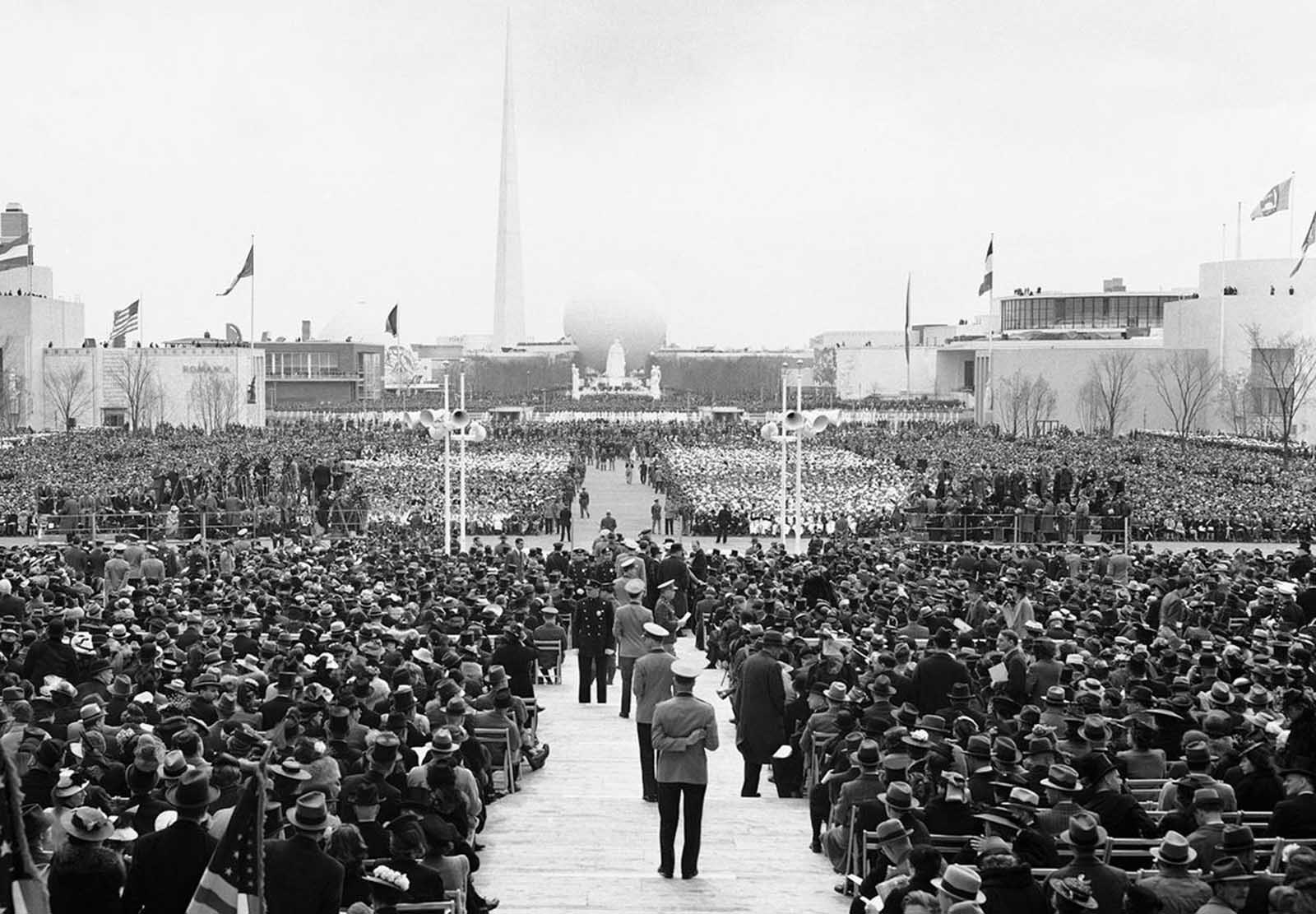 Some of the 35,000 guests of honor who listened to the opening speeches in the Court of Peace at the New York World's Fair, on April 30, 1939.