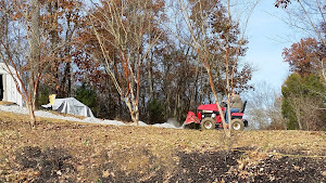 Tim working on the path/driveway