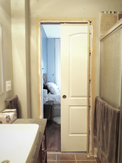 view of pocket door inside bathroom