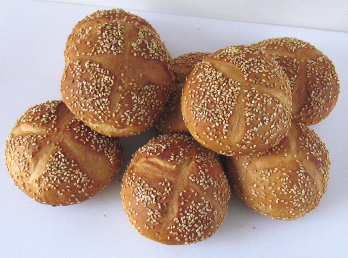 булочки paneteria. рисовая булочка с кунжутом. булка с черным и белым кунжутом. рисовая булочка с кунжутом. рисовая булочка с кунжутом.