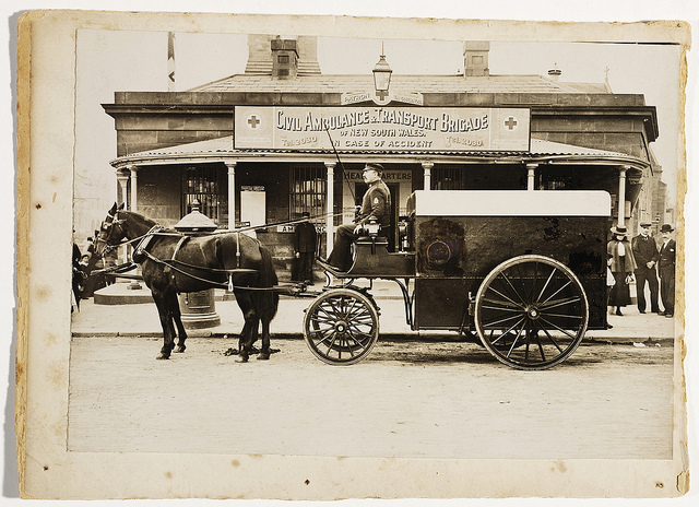 Horsedrawn ambulance outside Civil Ambulance & Transport Brigade headquarters, corner of George & Pitt Sts opposite the Benevolent Asylum, now Central Square, c. 1900, by unknown photographer.
