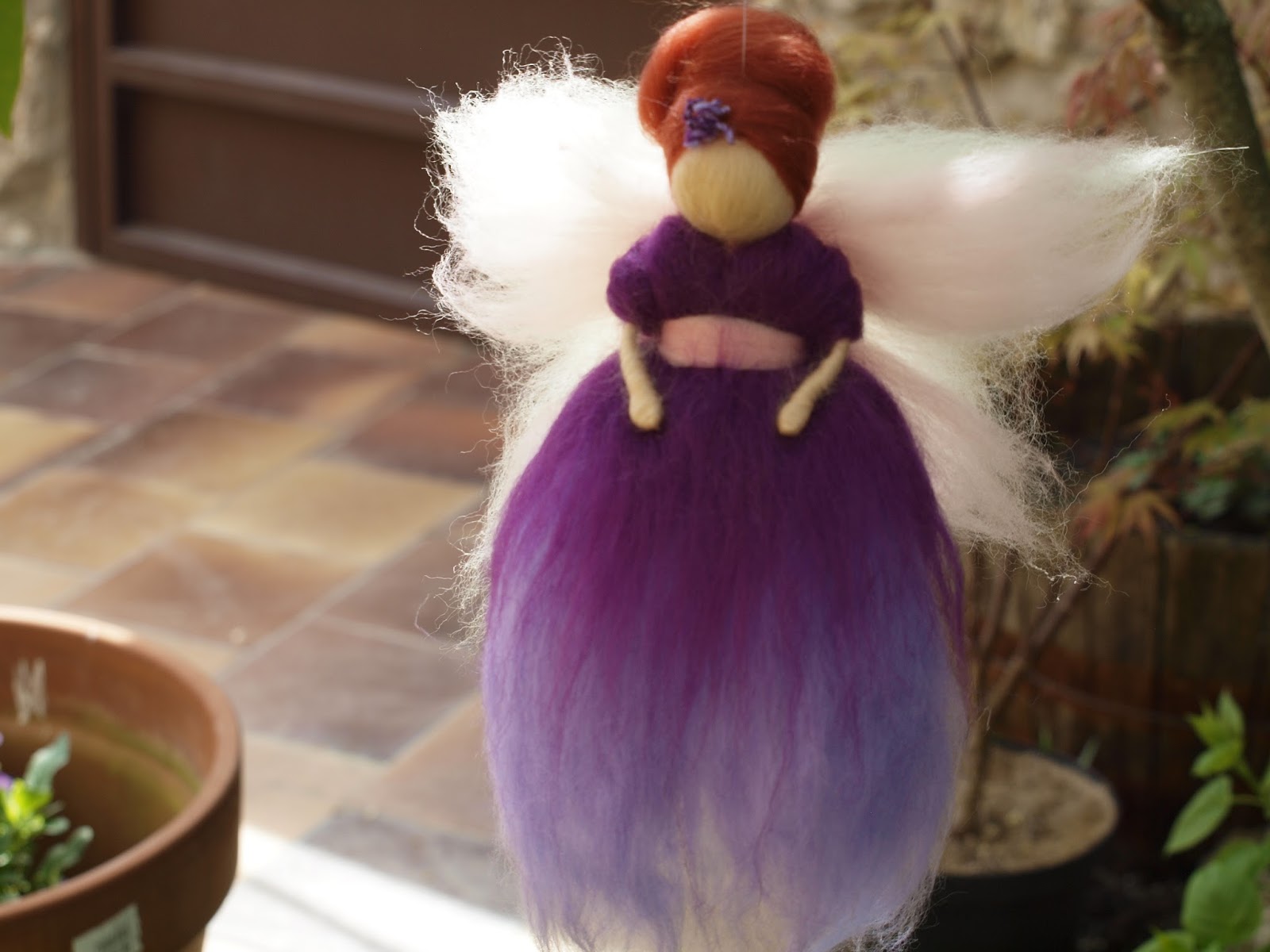 muñecas de lana cardada paso a paso
