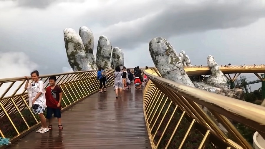 Golden Bridge, Vietnam -  A beautiful pedestrian bridge Lifted up in the air by a pair of giant hands