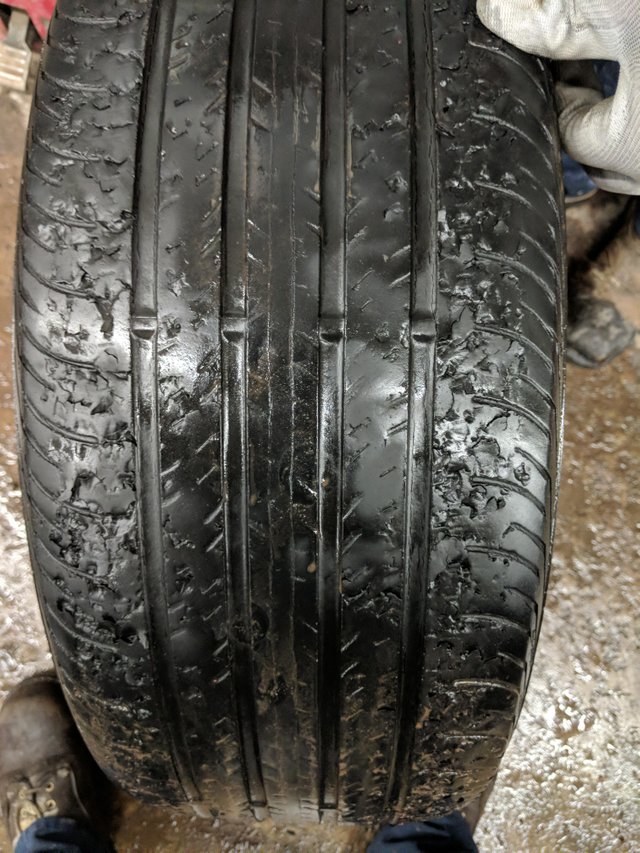 Just A Car Guy strange looking tire damage is the result of gravel